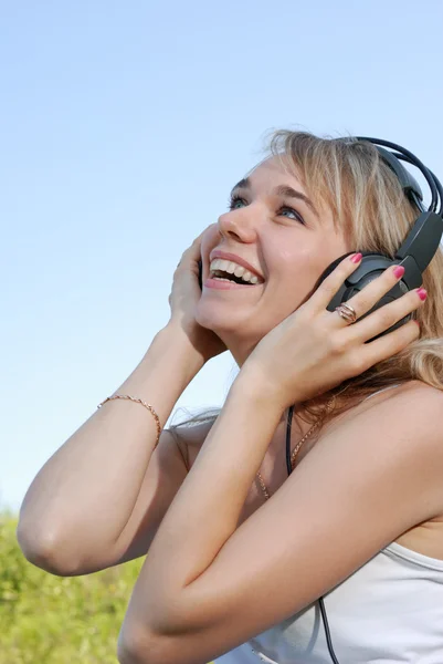 stock image The girl in headphones