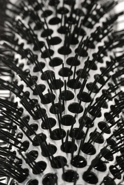 Hairbrush steel background — Stock Photo, Image