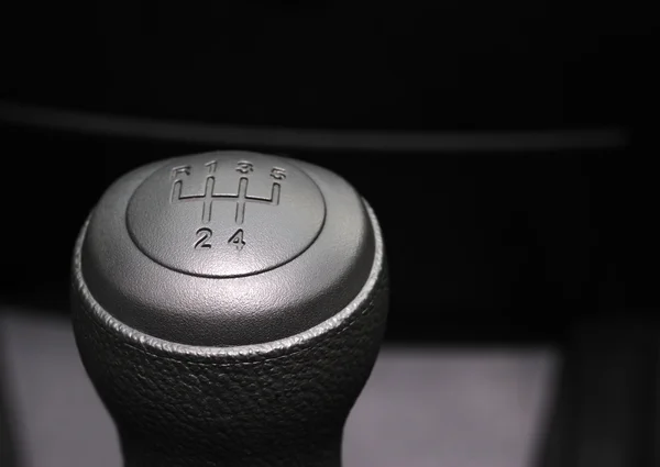 stock image The handle of switching of transfers in the car