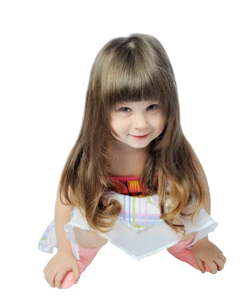 Glückliches kleines Mädchen isoliert auf einem weißen — Stockfoto