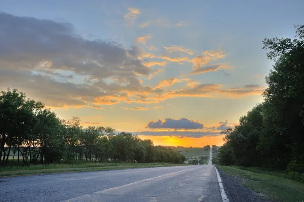 Road and sunset — Stock Photo, Image
