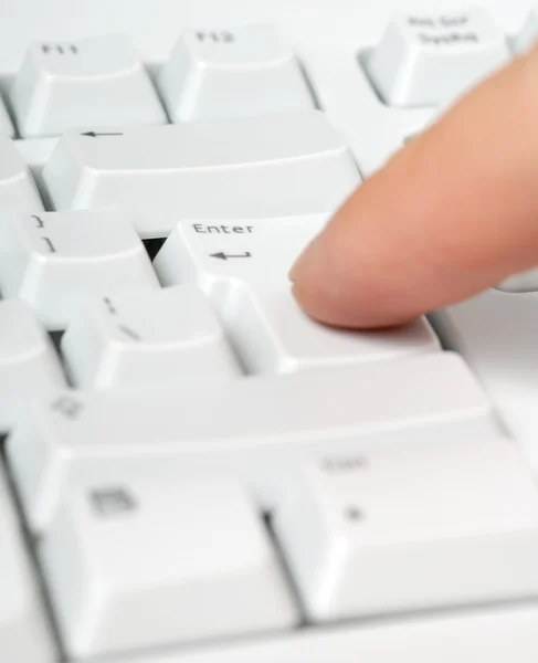 Keyboard and finger — Stock Photo, Image
