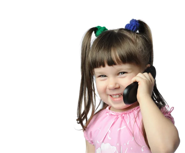 Little girl with a mobile phone — Stock Photo, Image