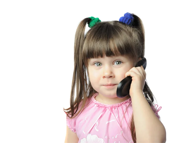 Little girl with a mobile phone — Stock Photo, Image