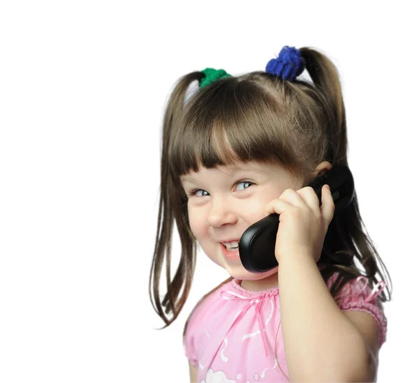 Bambina con un telefono cellulare — Foto Stock
