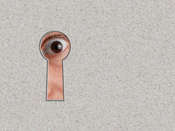 Patrzeć przez dziurkę od klucza w mur — Zdjęcie stockowe