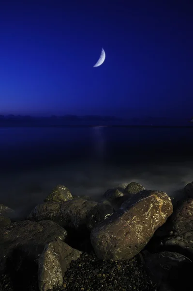 stock image The moon and the sea