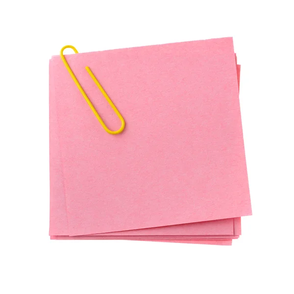Nota de papel vermelho com clinch amarelo — Fotografia de Stock