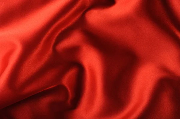 Красный атласный фон — стоковое фото