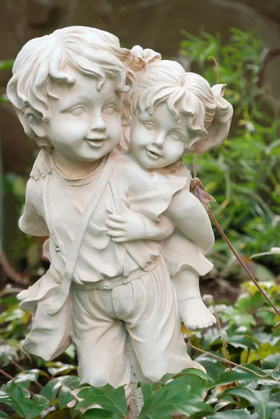 stock image Sculpture of the boy and the girl