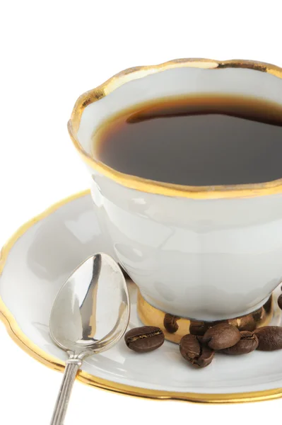 Xícara de café elegante com colher de prata e semente — Fotografia de Stock