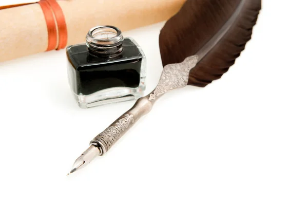stock image Feather quill ,inkwell and parchment roll