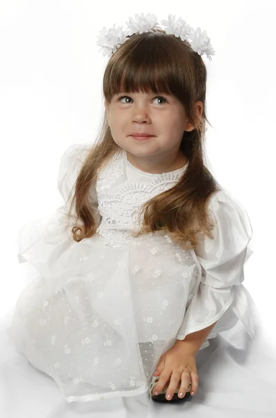 La ragazza in un vestito bianco — Foto Stock