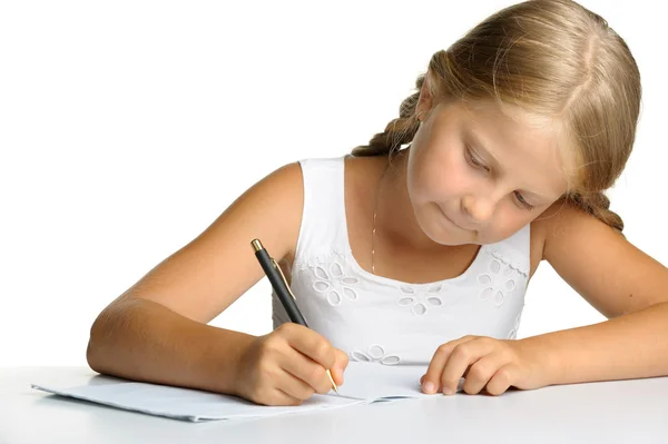 Schreibt das Mädchen zu Schreibbüchern. die Entscheidung der Lehren. — Stockfoto
