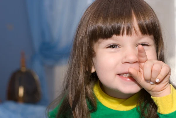 Mała dziewczynka i palec — Zdjęcie stockowe