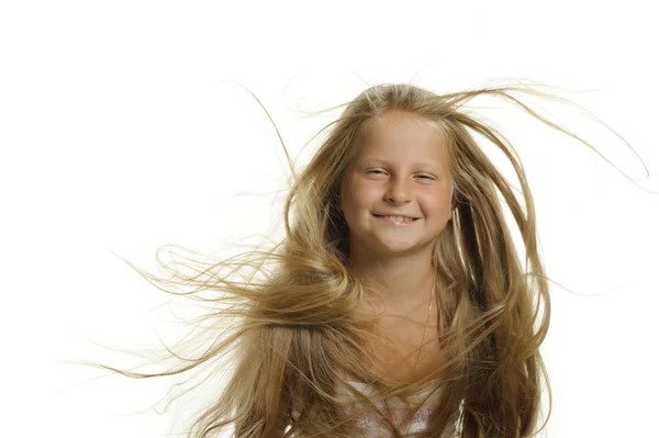 Das hübsche Mädchen die Blondine mit den fliegenden Haaren — Stockfoto