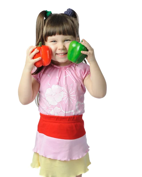 The little girl with color pepper — Stock Photo, Image