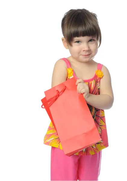 Das kleine Mädchen mit Überraschungspaket — Stockfoto
