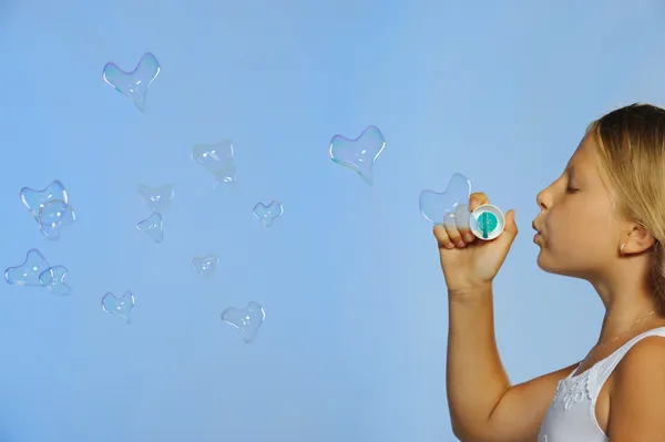 The pretty girl with bubbles heart — Stock Photo, Image