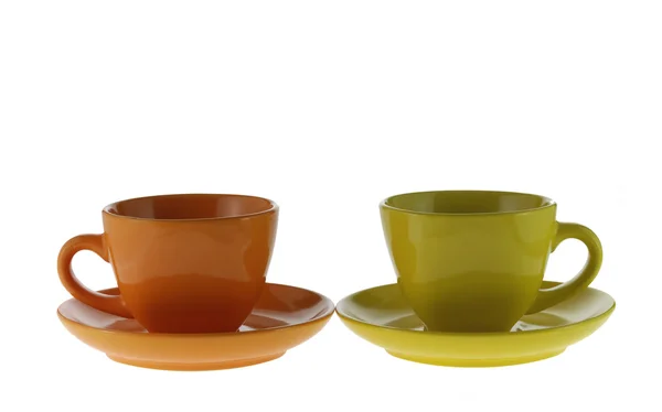 Две цветные чашки — стоковое фото