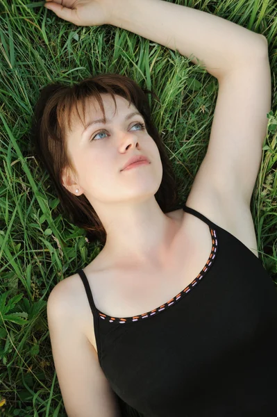 The girl in a grass — Stock Photo, Image