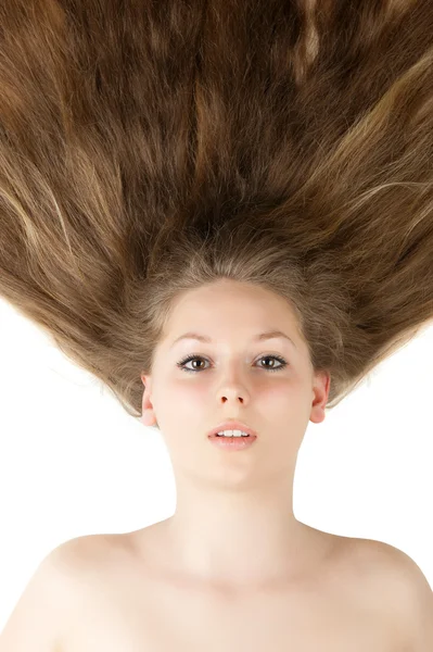 Υγιή και όμορφα μακριά μαλλιά closeup σε κίνηση που δημιουργήθηκε από τον άνεμο — Φωτογραφία Αρχείου