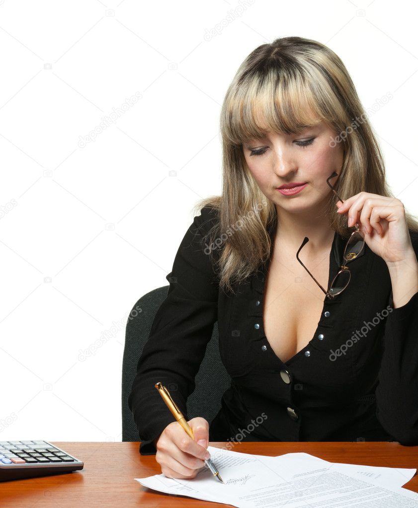 The business woman signs the contract