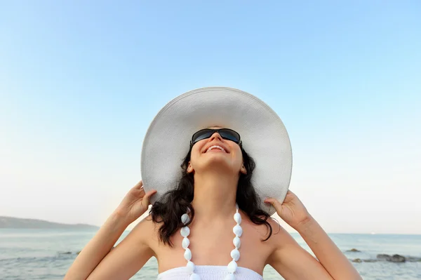 Portrait of the young woman in a hat — Stock Photo, Image