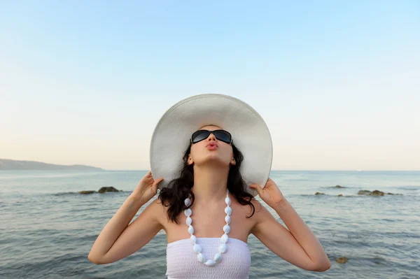Portrait of the young woman in a hat — Stock Photo, Image