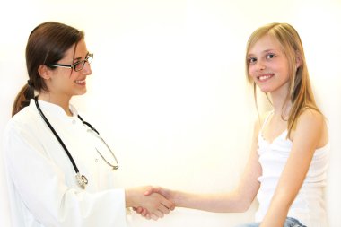 Girl with doctor shaking hands clipart