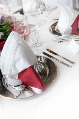 Formal, elegant table decoration in red clipart