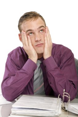 Exhausted man in office with documents clipart