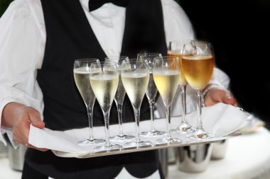 Waiters served champagne and wine clipart