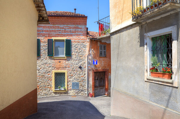 Old house among new in Diano D'Alba, Italy.