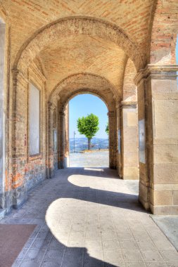 Ancient arch pass in Diano D'Alba, Italy. clipart