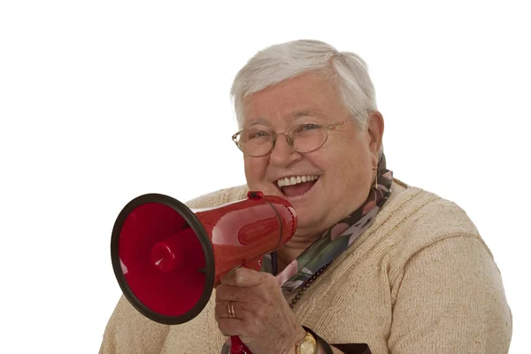 Vrouwelijke senior met megafoon — Stockfoto