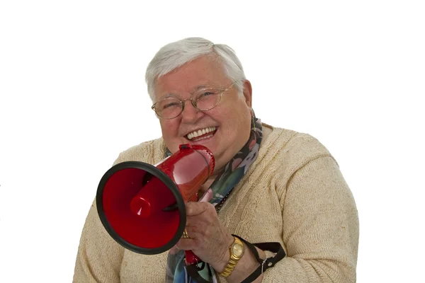 Female senior with megaphone — Stock Photo, Image