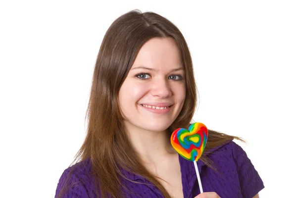 Vänlig ung kvinna med lollipop — Stockfoto