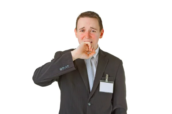 Уставший молодой бизнесмен зевает — стоковое фото