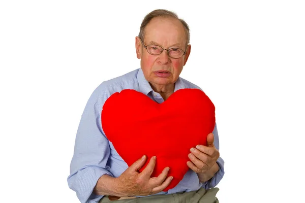 Muž starší červené srdce — Stock fotografie