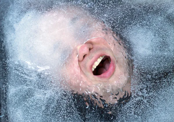 Gasping for Air Through the Ice Stock Photo