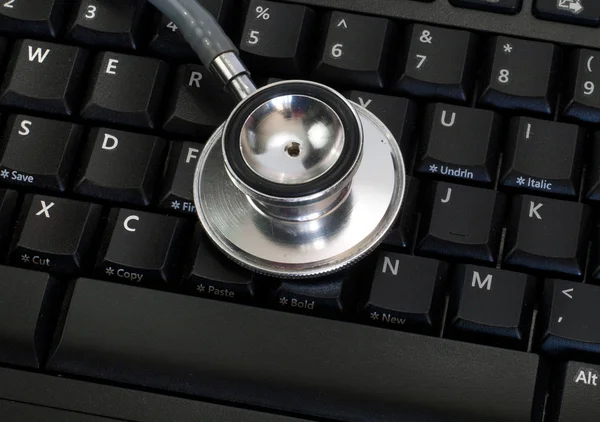 stock image Stethoscope on Keyboard