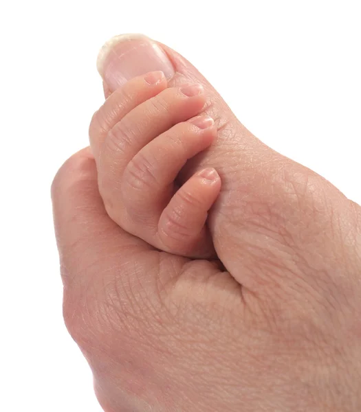 Baby hält weiblichen Finger — Stockfoto