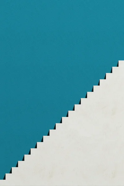 Witte stappen en blauwe muur — Stockfoto