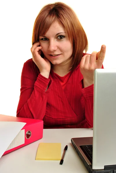 Büroassistentin mit erhobenem Zeigefinger — Stockfoto