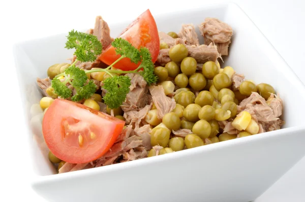Tuna salad with tomato, corn and peas — Stock Photo, Image