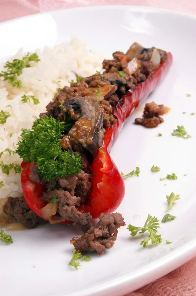 Some organic red paprika with mince and rice — Stock Photo, Image
