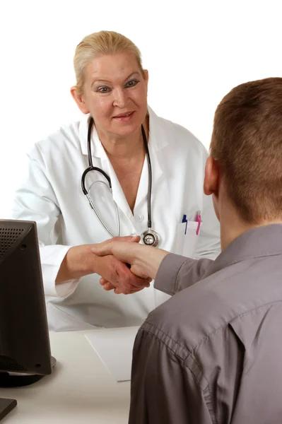 Assistente médica dá a mão para dizer olá — Fotografia de Stock