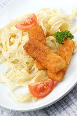 Fish sticks and home made noodles on a plate clipart