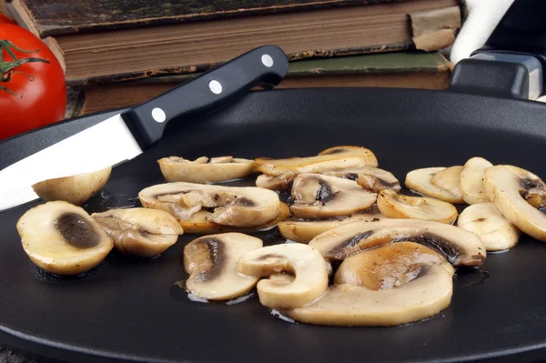 Chopped and grilled mushrooms in a pan — Stock Photo, Image